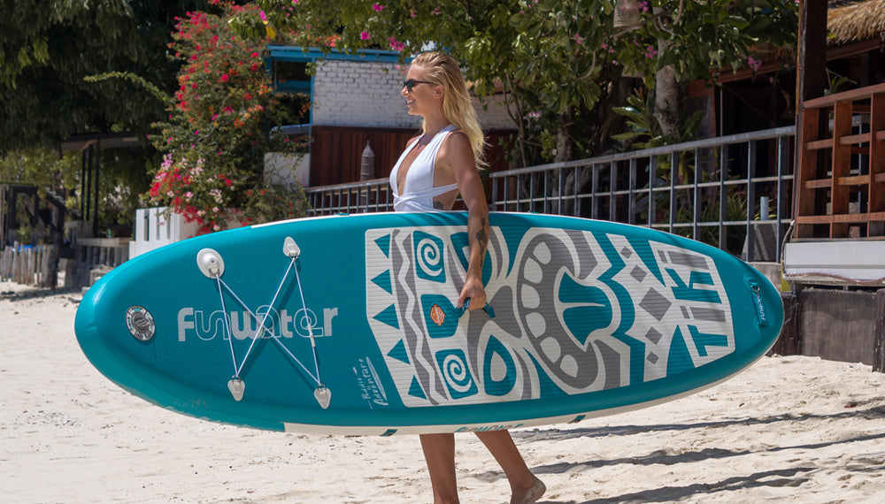a woman with her Funwater new tiki series blue color inflatable paddle boards