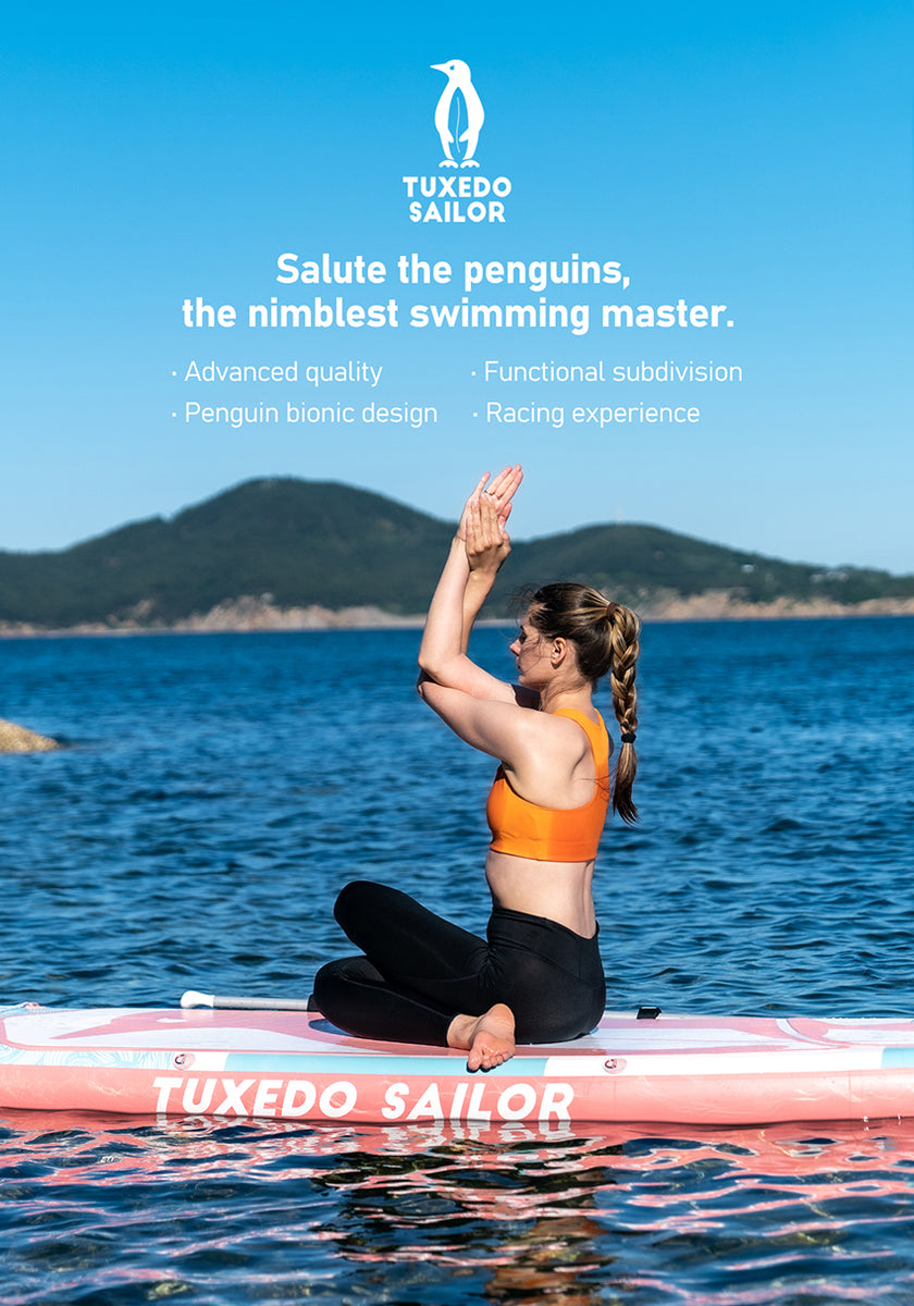 A woman doing yoga on a paddle board in the water