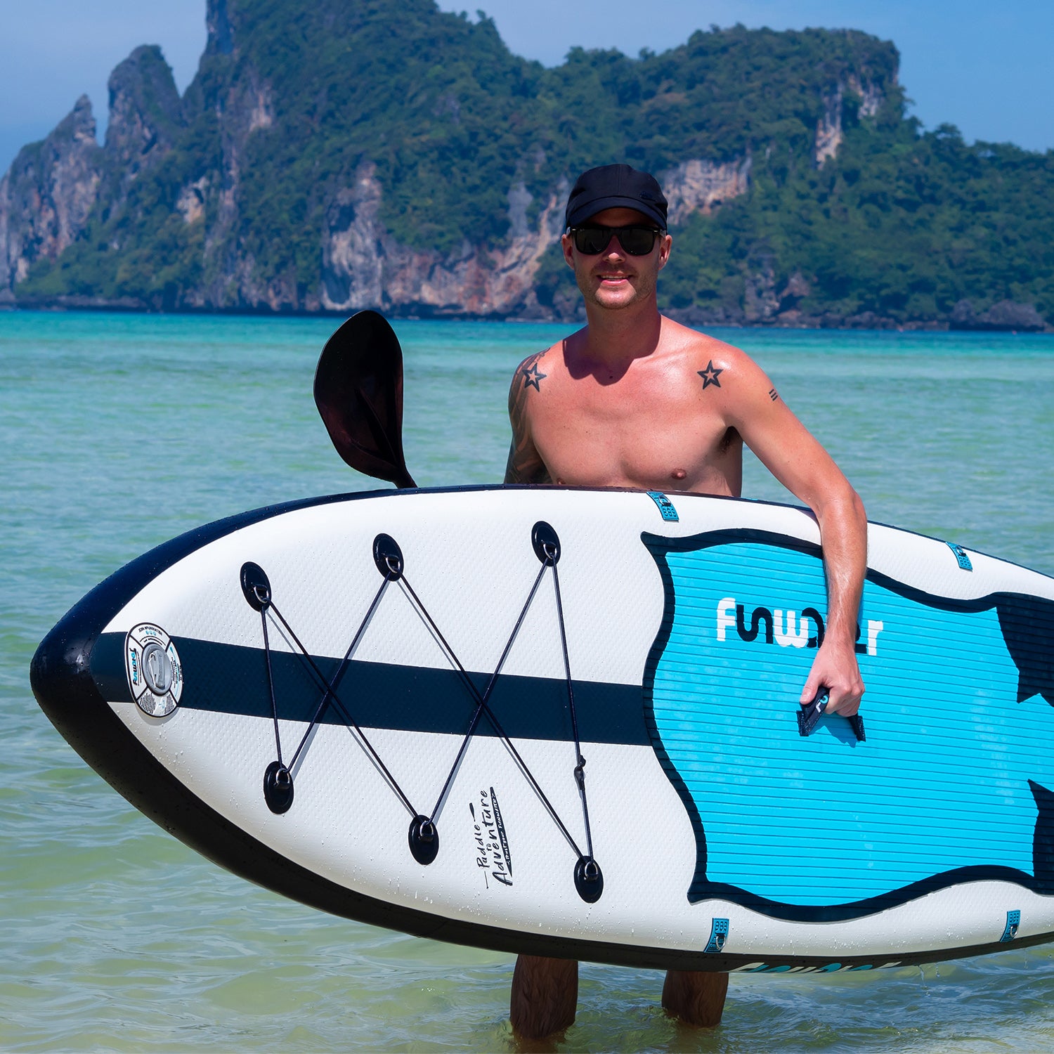 A man was carrying FUNWATER MANTA RAY inflatable SUP