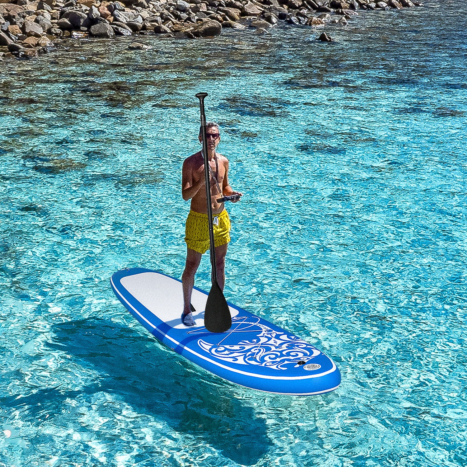 A man was paddleboarding on Feath-r-lite inflatable SUP