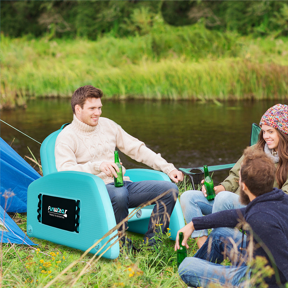 A man was sitting on Funwater inflatable sofa and chatting with friends